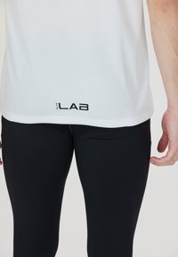 ELITE LAB TEAM - Sport T-Shirt - white