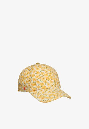Baseballkappe mit gebogenem Schirm, bedeckt mit einem weißen Stoff mit dichtem Muster aus kleinen gelben Blumen und grünen Blättern.