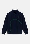WATER REPELLENT TAFFETA UNISEX - Veste de survêtement - navy blue/calathea