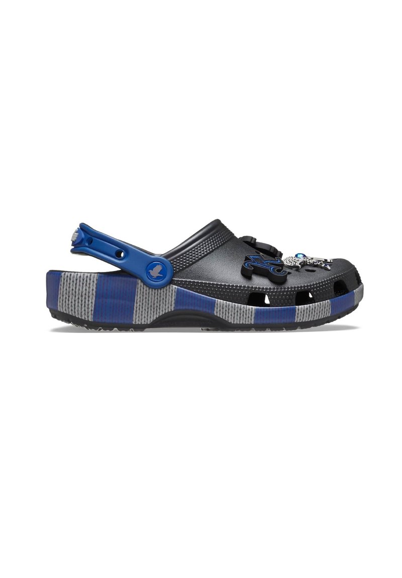 Black crocs with blue accents, textured upper, ventilation holes, and a patterned gray sole. Features decorative charms on the front.