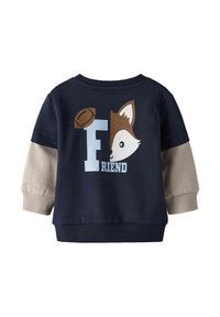 Sweatshirt marine avec des manches beiges, présentant un graphique de renard, un ballon de football, et le texte "F FRIEND" en bleu. Tissu doux et poignets côtelés.