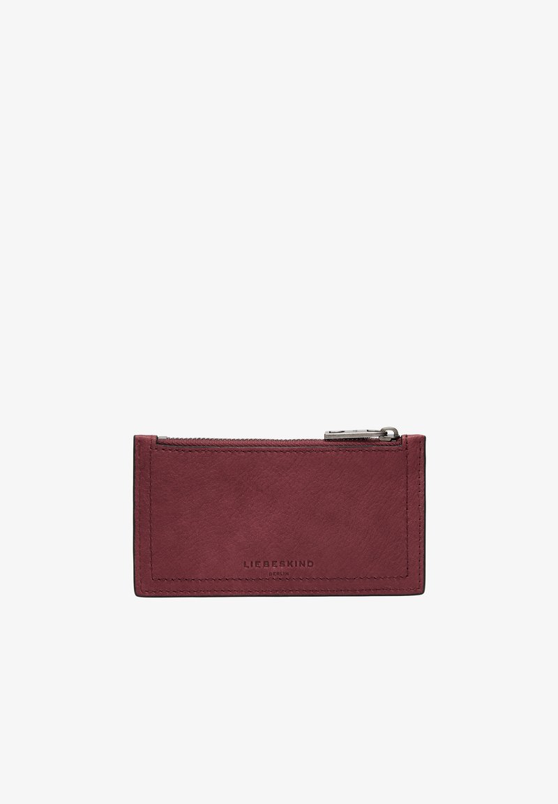 Portefeuille en cuir bordeaux avec une texture lisse, de forme rectangulaire, et un compartiment zippé. Présente le logo embossé "Liebeskind Berlin".
