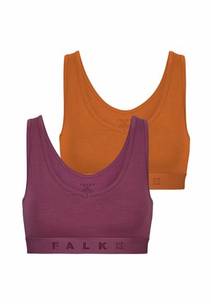 Dwie bezszwowe sportowe biustonosze, jeden fioletowy z napisem „FALKE” na pasku, drugi jednokolorowy pomarańczowy, oba z szerokimi ramiączkami i okrągłymi dekoltami.