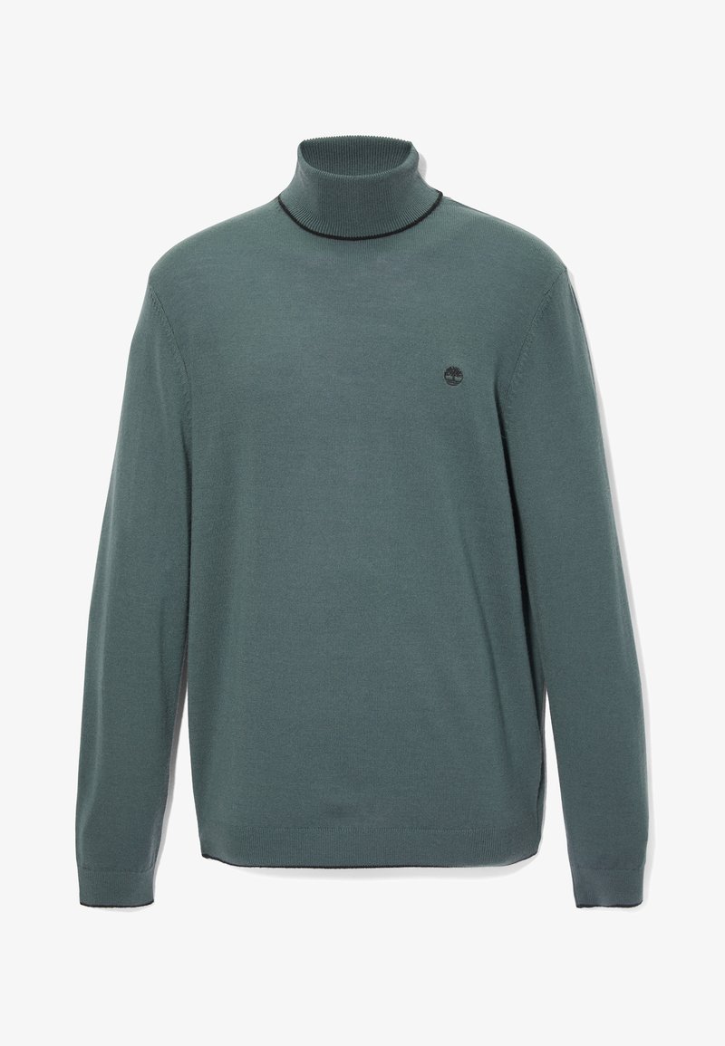 Pull à col roulé en mélange de coton vert foncé. Caractéristiques : manches longues, poignets côtelés, et petit logo sur la poitrine. Texture distinctive.