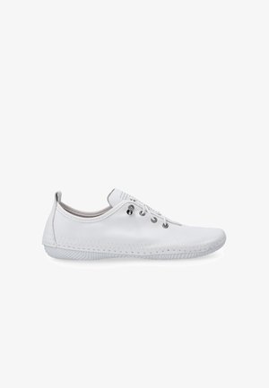White sneaker made of smooth leather, featuring round eyelets, a low-profile design, textured outsole, and stitching details along the edge.