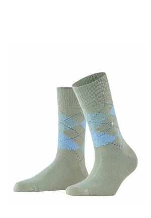 Strick Baumwollsocken in Hellgrün mit einem blauen Argyle-Muster und gerippten Bündchen. Glatte Textur mit verstärkten Details an Zehen und Ferse.