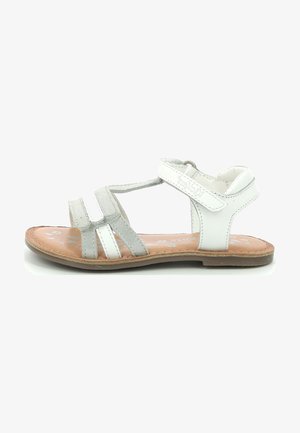 Lichtgrijze en witte sandaal van leer en suede, met verstelbare banden, een platte zool en een gevoerde binnenzool.
