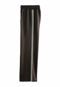 Brązowe spodnie dresowe z białym pionowym paskiem, wykonane z miękkiego materiału, z elastycznym paskiem w talii i luźnym krojem.