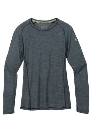 Långärmad träningsskorta i mörkgrått, tillverkad av mjukt tyg. Har kontrasterande svarta sömmar och en liten logotyp på vänster ärm.