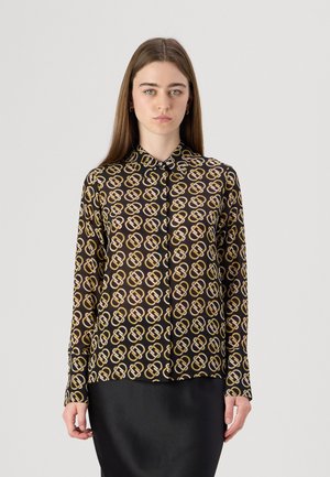 Schwarze Knopfbluse mit geometrischem Muster in Gold und Beige. Lange Ärmel mit Manschetten, glatte Textur und klassisches Kragen-design.
