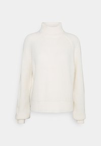 Maglione a collo alto in maglia crema con maniche raglan, polsini e orlo a coste. Texture liscia con vestibilità ampia, che offre calore e comfort.