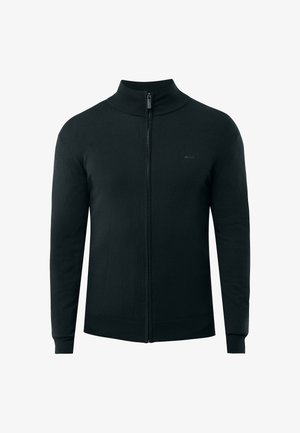 Zwarte ritscardigan met een hoge kraag, geribbelde manchetten en een gladde textuur. Subtiele branding op de borst.