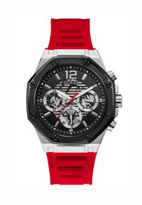 Zwart en zilverkleurig analoog horloge met een rode siliconen band. De kenmerken zijn onder andere een display met meerdere wijzers, een getextureerd oppervlak en opvallende uurmarkeringen.