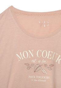 Light pink cotton t-shirt featuring the text "MON COEUR est à toi POUR TOUJOURS" with leaf graphics and a subtle crew neck design.