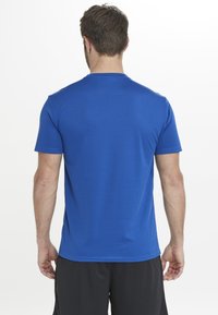 Endurance DIPAT - T-shirt till träning - 2158 deep ocean
