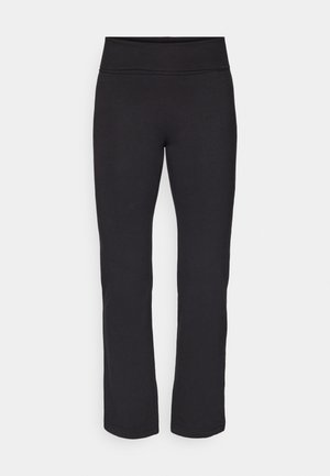 Leggings noirs en tissu lisse et extensible avec une large taille. Ils ont des jambes droites et longues sans motifs ni accents visibles.