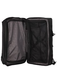 Sac de voyage noir avec deux compartiments, ouvertures zippées et poches en mesh. Fabriqué en tissu durable avec une doublure intérieure lisse.