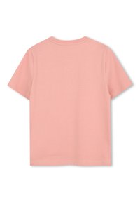 Κοντομάνικο μπλουζάκι από απαλό ροζ βαμβάκι, με στρογγυλή λαιμόκοψη και λεία, μονή υφή χωρίς σχέδια ή διακοσμήσεις.