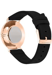 Runde Uhr mit einem Gehäuse aus Roségold und einem schwarzen Silikonarmband. Verfügt über einen glatten Rücken und metallische Verschlussdetails.