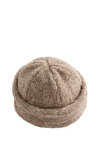 Gusti, smeđi beanie sa zaobljenim vrhom i zavrnutim rubom. Tekstuirana tkanina s vidljivim šavovima.
