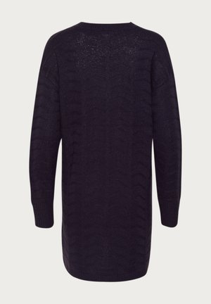 Long, dark navy knitted sweater with a textured zigzag pattern and ribbed cuffs. Crew neckline, mid-length, and slightly loose fit.