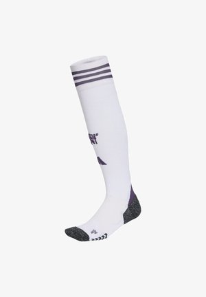 Weiße kniehohe Socke mit schwarzem Zehen- und Fersenbereich, drei schwarzen Streifen oben und schwarzen Logo-Mustern an Wade und Fuß.