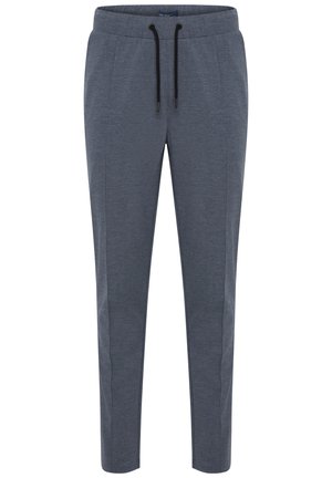 Graue Jogginghosen aus weichem Material mit einem Kordelzugbund, schmal zulaufenden Beinen und Seitentaschen für Funktionalität.