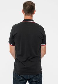 Paradiso Clothing THE ROLLING STONES CLASSIC TONGUE UNISEX - Polo shirt - black