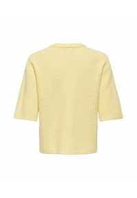 Pull en maille jaune doux à manches courtes, texture côtelée, et ourlet droit, présenté de dos sur fond blanc.