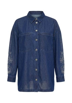 Mørkeblå denimskjorte med lange ærmer, knaplukning foran, to brystlommer og blomsterbroderi på begge ærmer nær manchetterne.