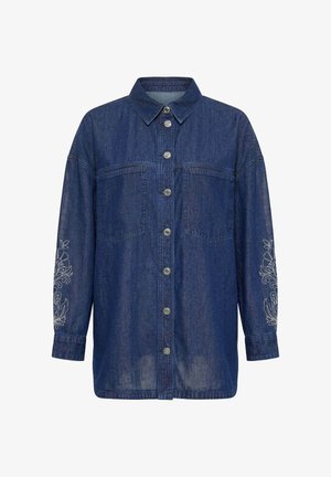 Dunkelblaues Denim-Langarmhemd mit durchgehender Knopfleiste, zwei Brusttaschen und Blumenstickerei an beiden Ärmeln nahe den Bündchen.