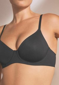 Next SMOOTHING NON PAD FULL CUP - Krūšturis ar stīpiņu - black