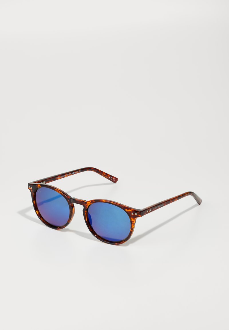 Tortoiseshell sunglasses with round frames, blue mirrored lenses, and patterned arms. Features subtle hardware accents at the temple.