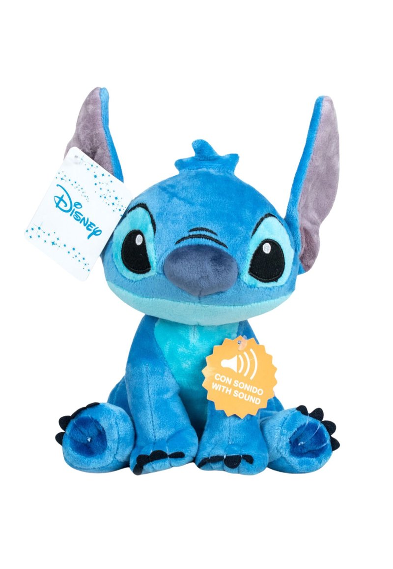 Blauwe pluche knuffel in de vorm van een cartoonfiguur, met grote oren, zwarte ogen en een label dat wijst op een geluidseigenschap. Zacht stof, gedetailleerde poten.