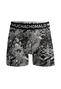 Črne in bele bokserice z geometrijskim in cvetličnim vzorcem. Elastičen pas z logotipom "MUCHACHOMALO". Mehka, raztegljiva tkanina.
