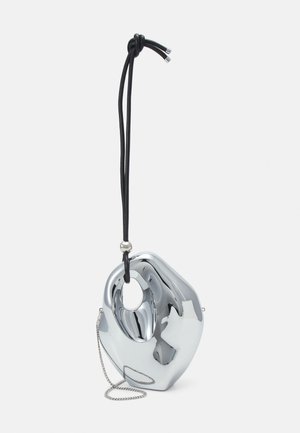 Chrome pouch bag with a fluid, abstract shape, featuring a black cord strap and a silver chain detail. Smooth, reflective surface.