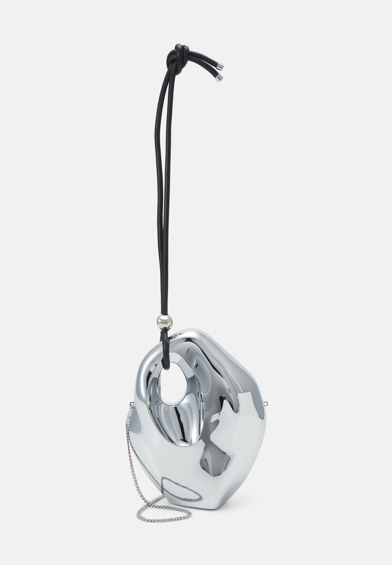 Chrome pouch bag with a fluid, abstract shape, featuring a black cord strap and a silver chain detail. Smooth, reflective surface.