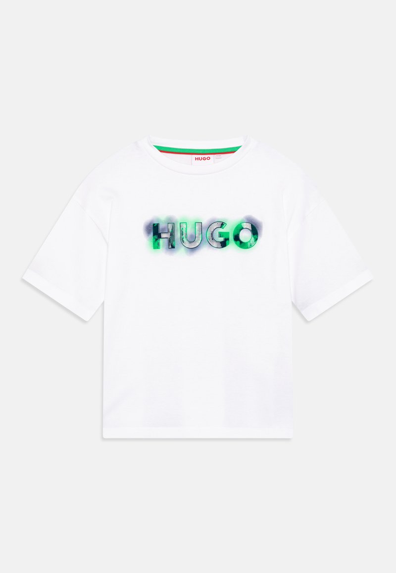 Bílý bavlněný tričko s potiskem 'HUGO' v zelené a černé barvě na přední straně. Krátké rukávy a kulatý výstřih.