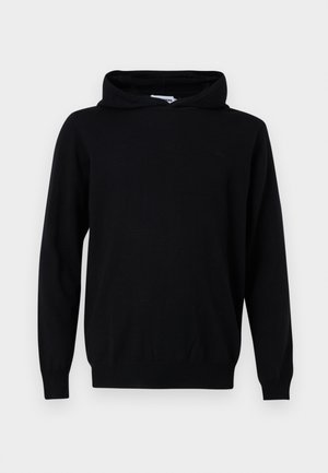 Sweat à capuche noir à manches longues avec couture centrale à l'avant et poignets et ourlet côtelés, présenté sur un fond gris clair uni.