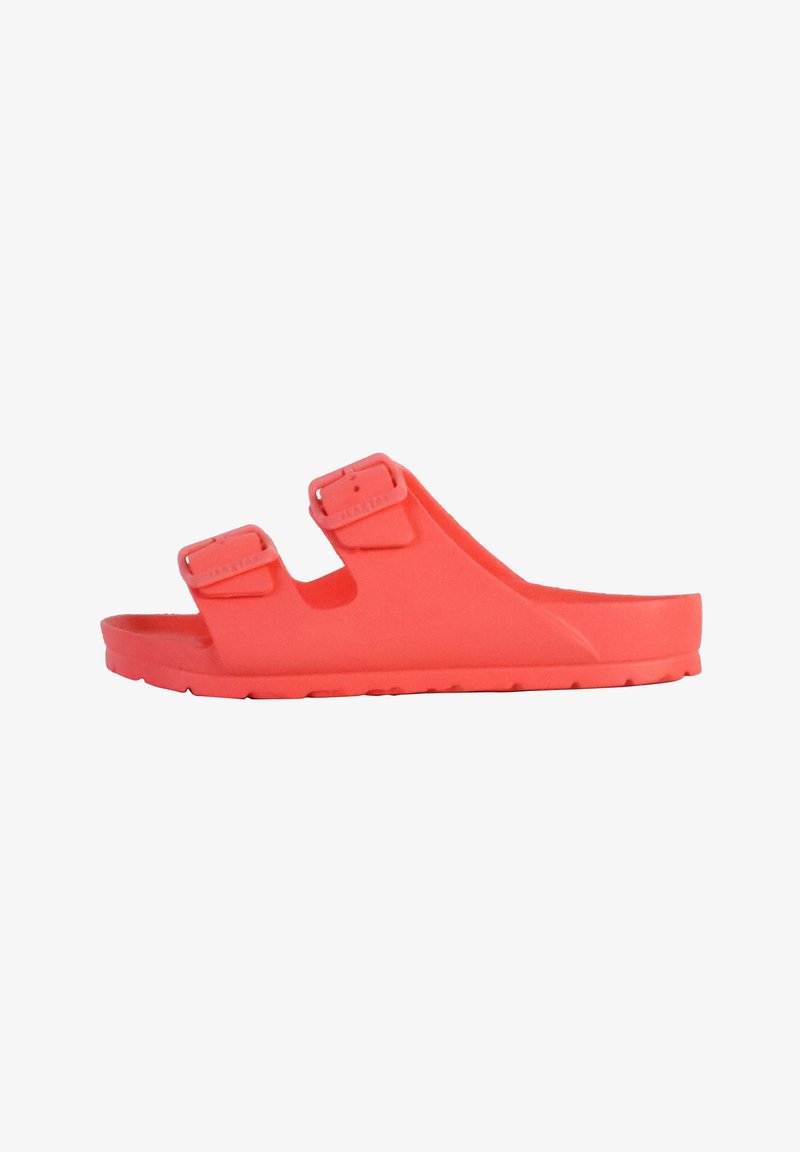 Red molded slide sandal with two adjustable straps, textured footbed, and a flat sole with a ribbed pattern for grip.