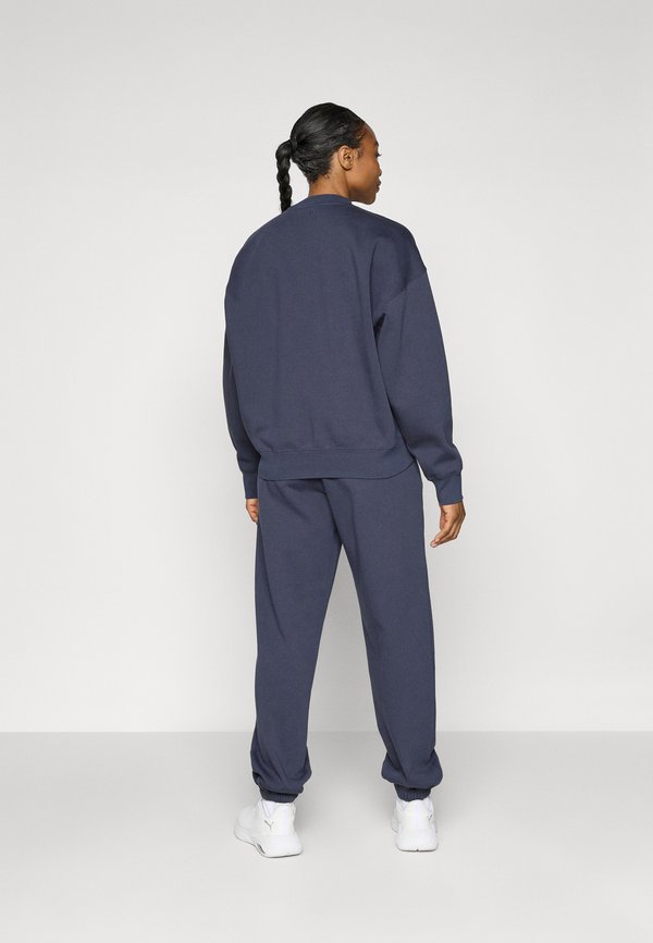 STUDIO SWEATPANTS - Tracksuit bottoms - odyssey gray4
