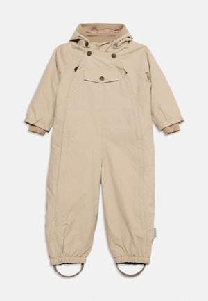 Beige hætteklædt vinterdragt til småbørn med lange ærmer, elastiske manchetter, forlommer med trykknap og fodstropper ved benåbningerne.