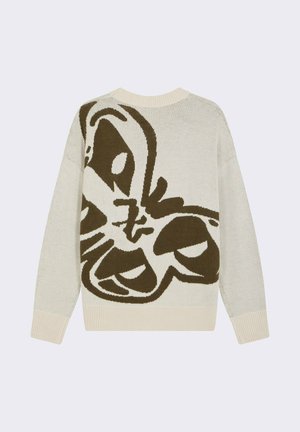 Cream sweater with a large brown abstract butterfly design. Features a textured knit, ribbed neckline, and cuffs. Casual fit.