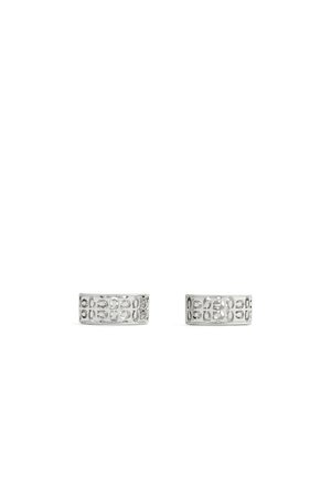Silver hoop earrings with cut-out geometric patterns, featuring a smooth, polished finish and a circular shape.