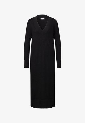 Robe en tricot côtelé noire avec un décolleté en V profond, des manches longues et une silhouette droite, atteignant la mi-mollet. Texture douce.