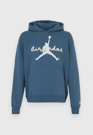 Kék pamut kapucnis pulóver kenguruzsebbel, bordázott mandzsettával és szegéllyel. Nagy fehér "Air Jordan" logóval és sziluett grafikával díszítve.