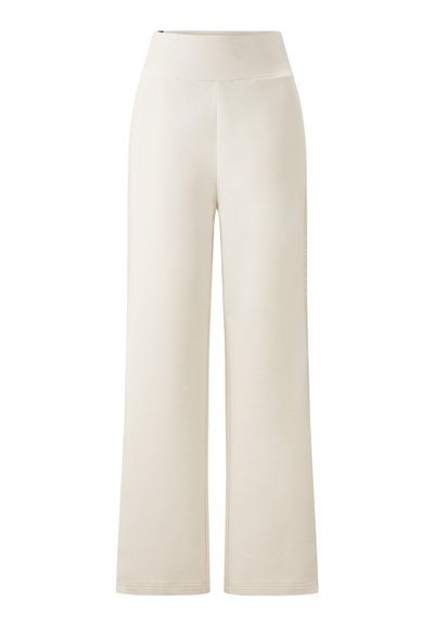 Light beige wide-leg pants with a high waistband, made from soft fabric. Features subtle stitching along the seams and no visible hardware.