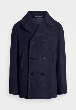 Manteau en laine bleu marine avec un design à double boutonnage, grand col à revers et deux poches latérales ; il comporte six boutons noirs.