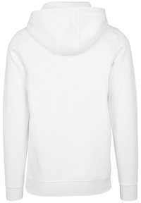 Hvit hettegenser med snøring, lange ermer, ribbestrikkede mansjetter og ribbestrikket kant. Stoffet fremstår glatt med et avslappet design.
