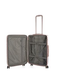 Maleta rígida de color rosa claro con un diseño geométrico. Incluye un interior gris con correas, un compartimento con cremallera y un asa retráctil.